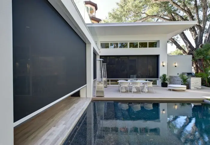 Motorized screen on a covered patio